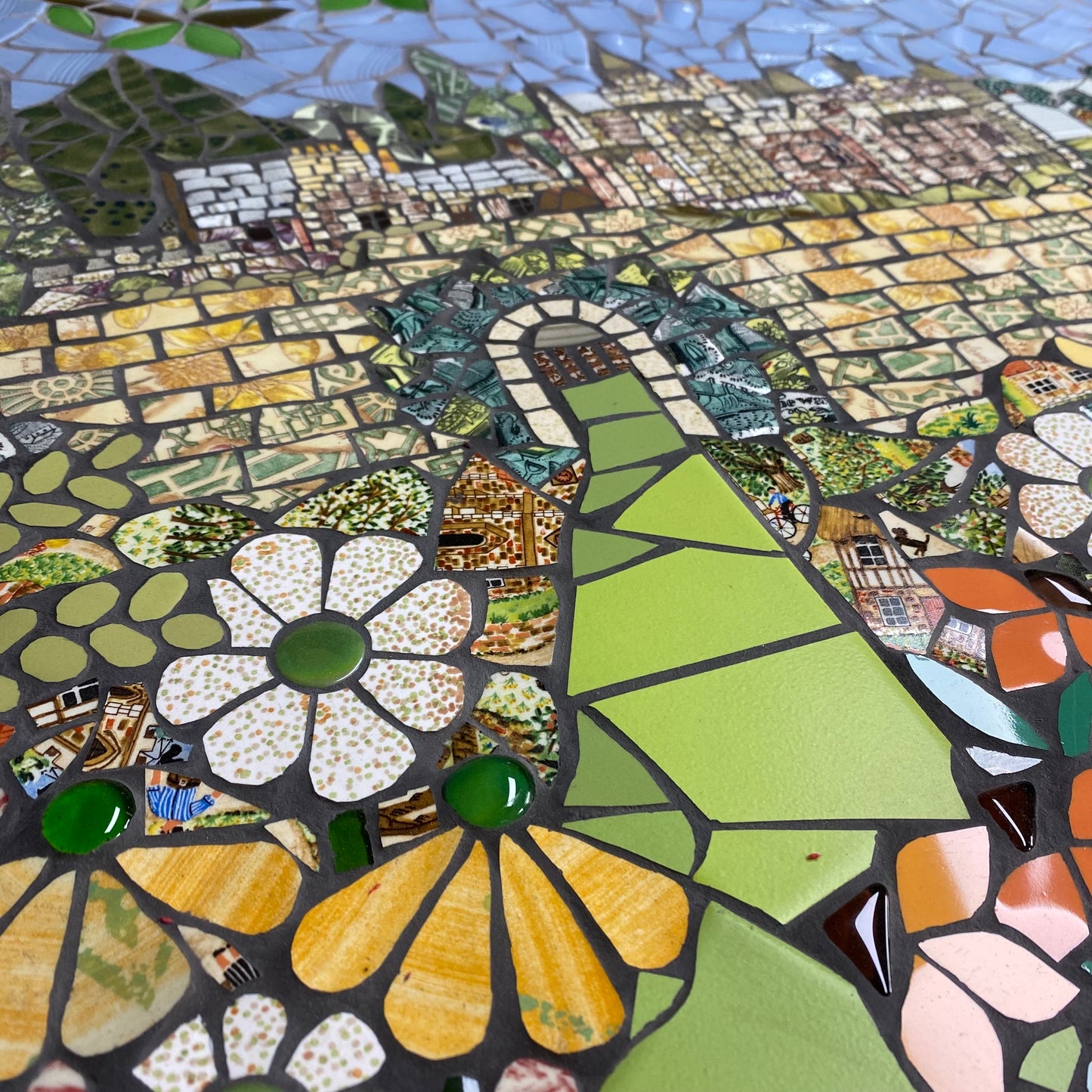 A close up image of Abbotsford House, depicted in mosaic made from recycled materials