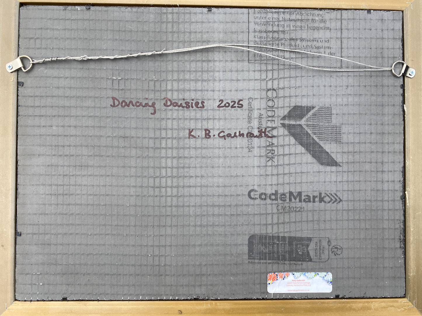 Wedi board reverse with 'Dancing Daisies 2025' and 'K. B. Galbraith' text
