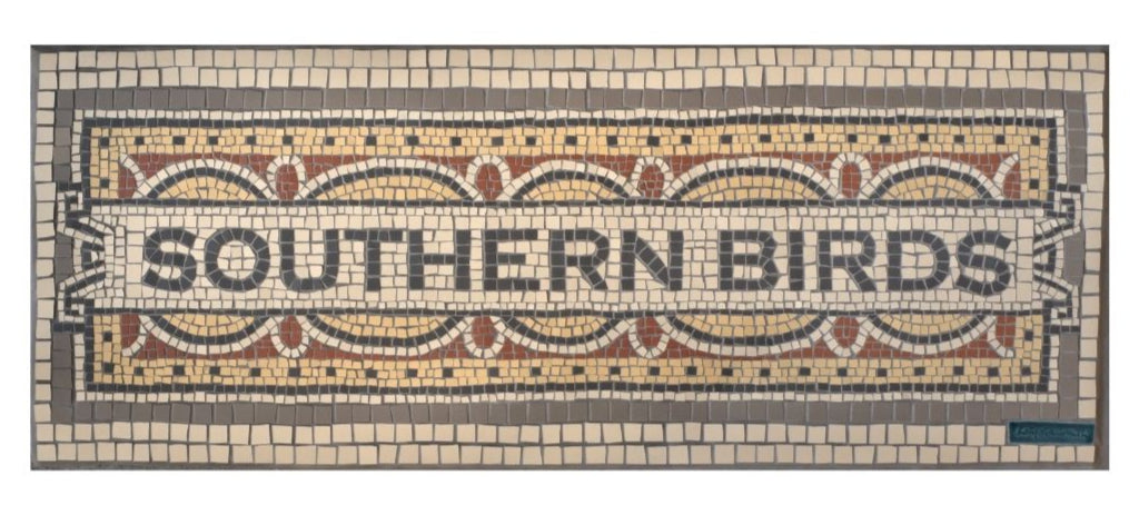 Southern Birds written in black in mosaic on a traditional mosaic style in browns and yellow