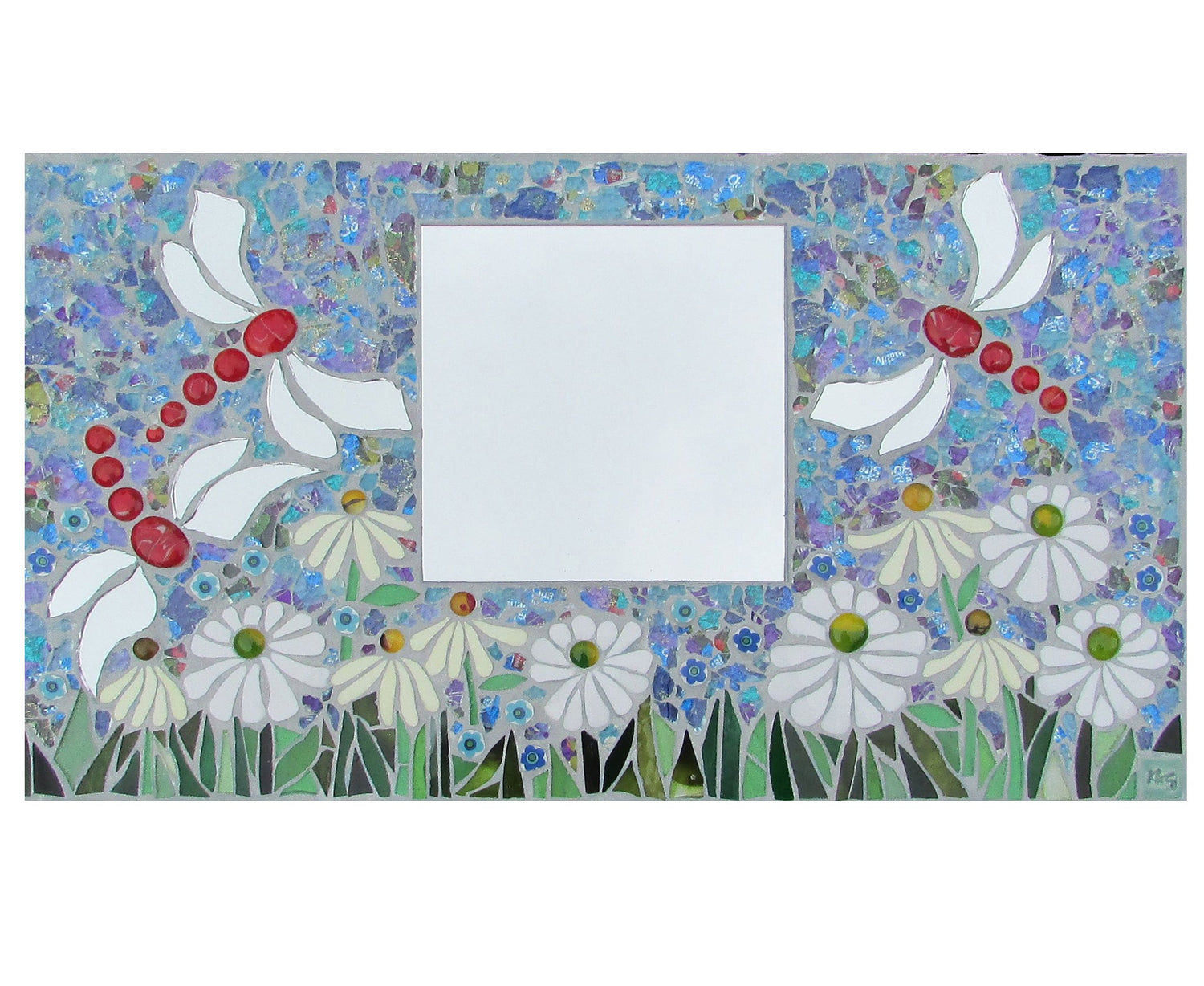 three dragonflies with red bodies and a variety of white daisies in mosaic with a speckled blue background