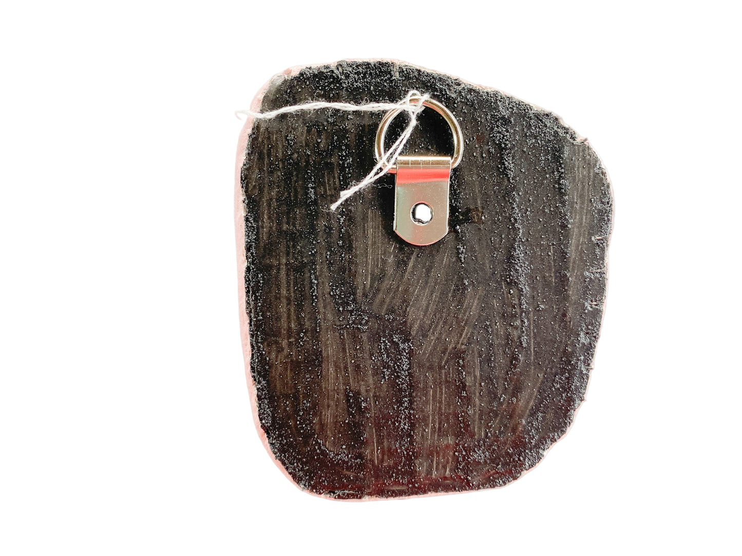 textured reverse side of mosaic with d-ring on a white background