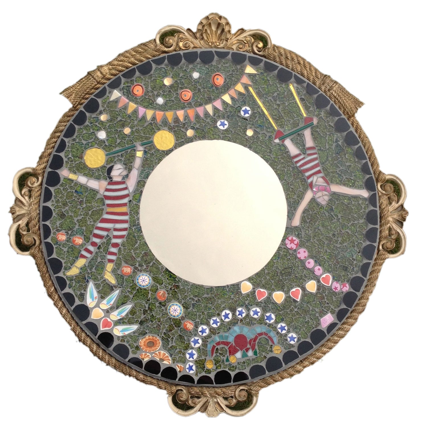 A gilt frame encases a mosaic with mirror at the centre of a design with a strongman and a trapeze artist