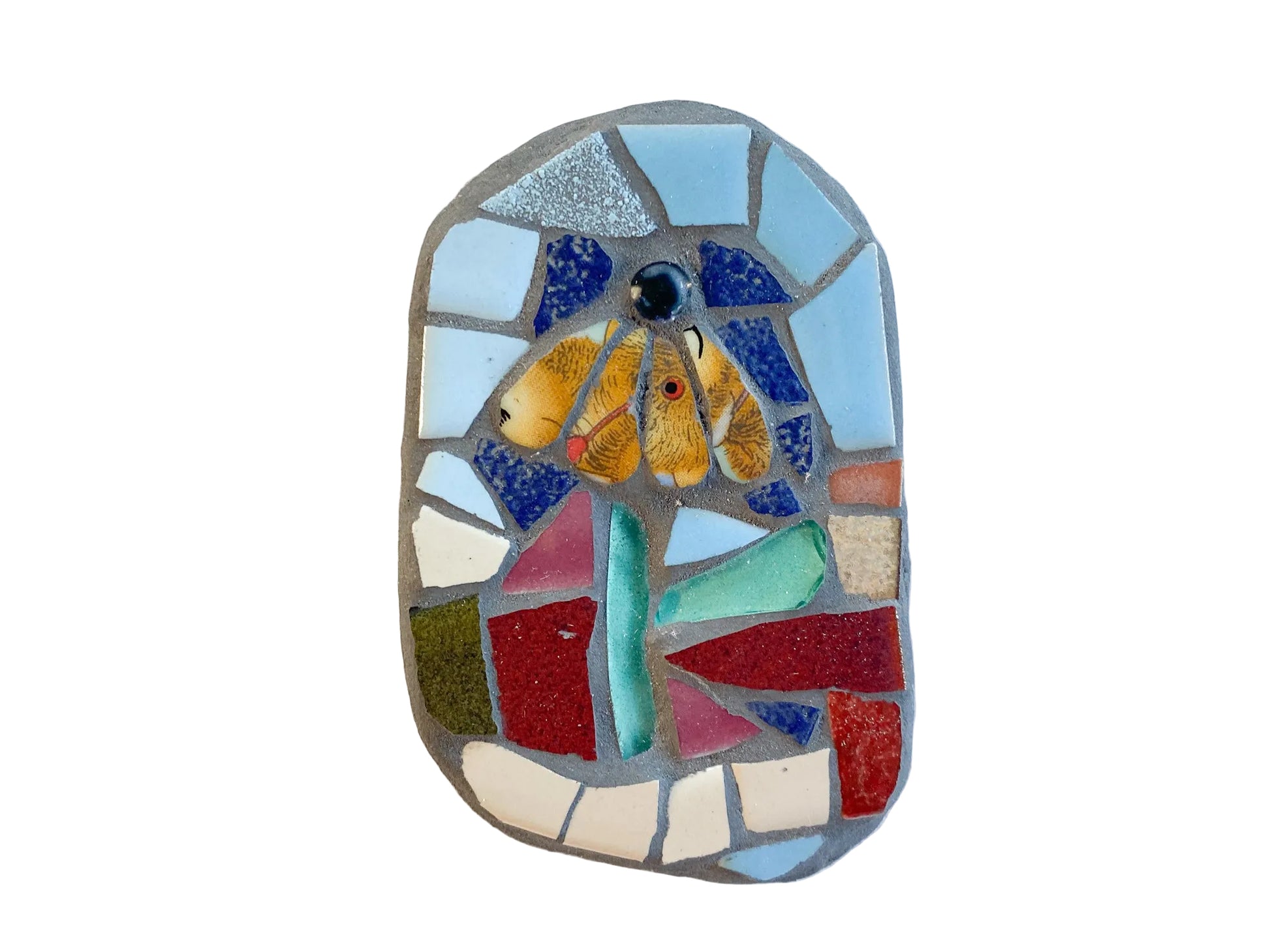 Mosaic art piece with an ochre coloured flower design mixed toned background, photographed on white