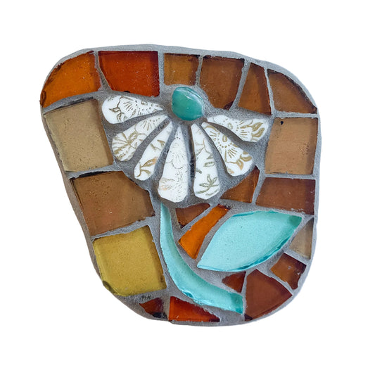 Mosaic artwork of a flower with multicolored tiles on a white background
