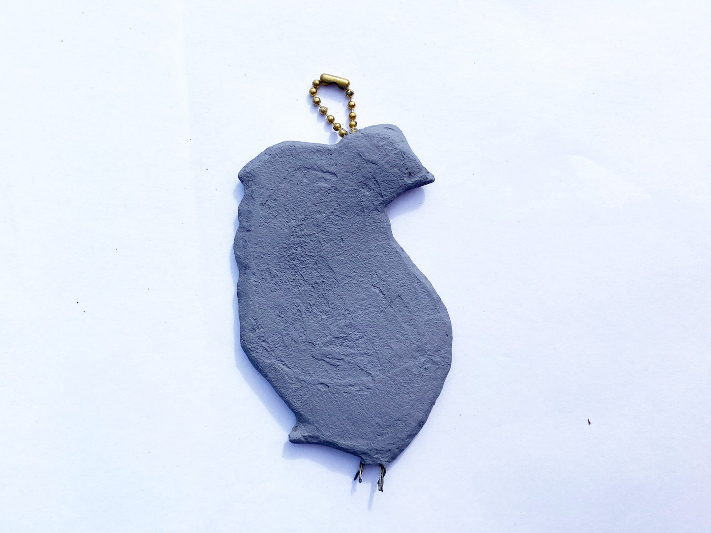 Mosaic peacock,  Made from crockery. photographed to show the reverse of the mosaic, which is painted grey