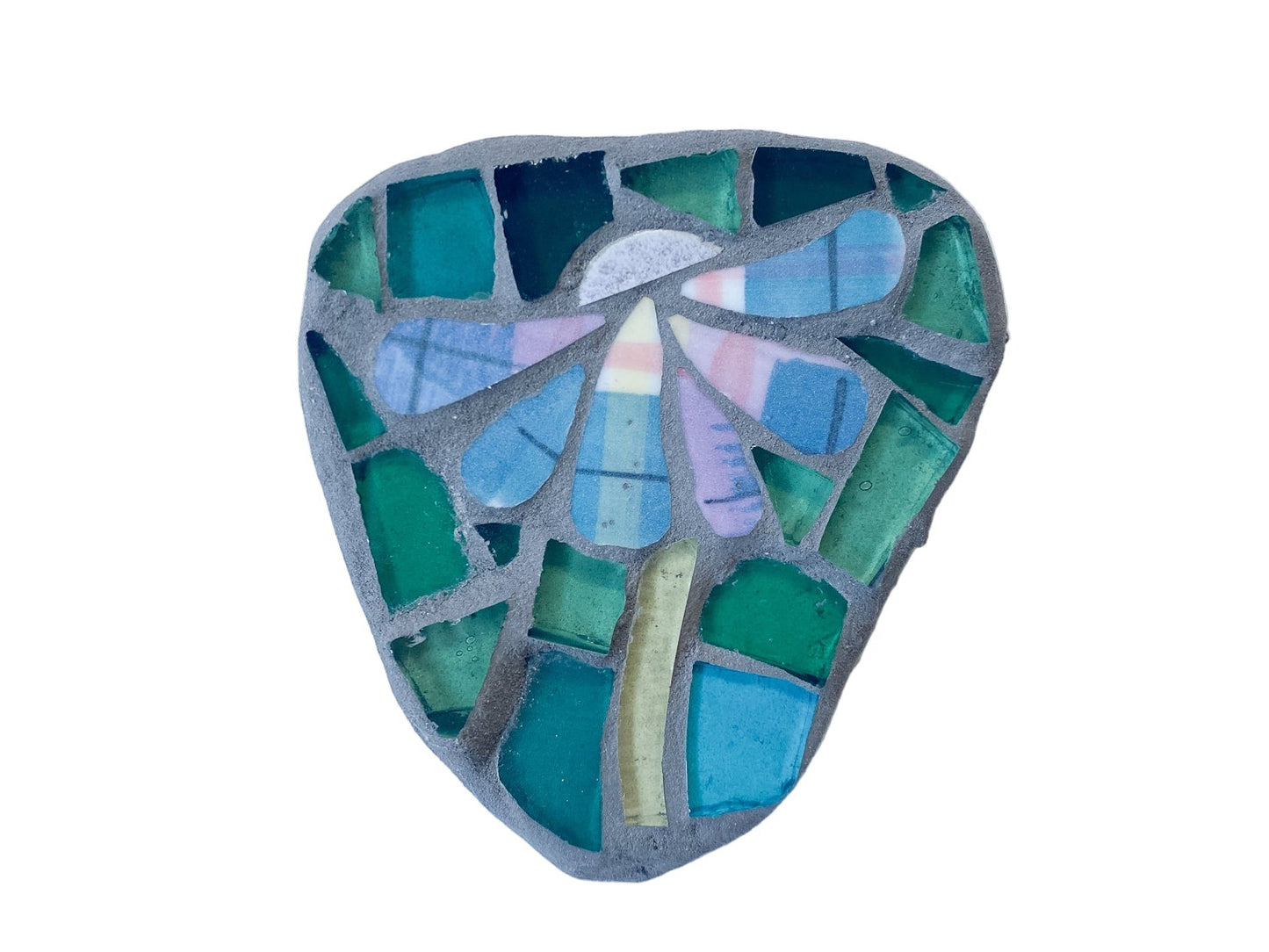 Mosaic flowers with blue and green colours photographed on a light white background