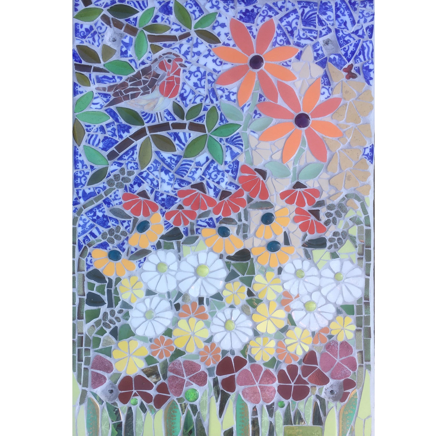 colourful mosaic panel with daisies and other flowers with a branch coming in from the corner with a robin on